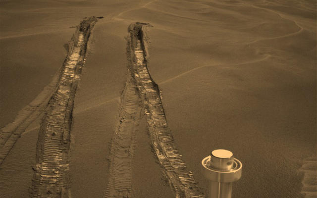 Opportunity's wheels dug more than 10 centimeters (4 inches) deep into the soft, sandy material of a wind-shaped ripple in Mars' Meridiani Planum region during the rover's 446th martian day, or sol (April 26, 2005).