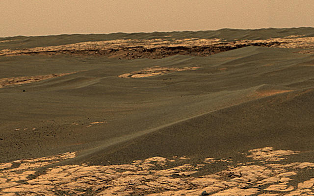 This image shows a portion of the rim of "Erebus Crater" in the Meridiani Planum region of Mars.