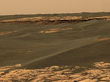 This image shows a portion of the rim of "Erebus Crater" in the Meridiani Planum region of Mars.