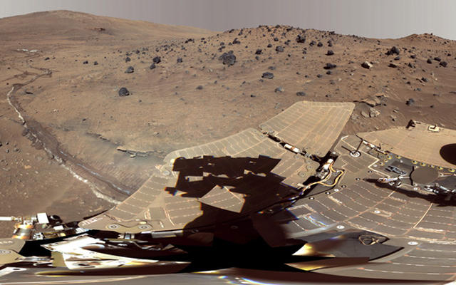 This beautiful scene reveals a tremendous amount of detail in Spirit's surroundings at a place called "Winter Haven," where the rover spent many months parked on a north-facing slope in order to keep its solar panels pointed toward the sun for the winter.  During this time, it captured several images to create this high resolution panorama.