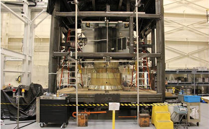 The MAVEN spacecraft structure is placed into a reaction chamber, where it completed a static loads test to ensure that it will withstand the extreme forces of launch.