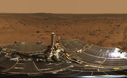 Hundreds of images taken by Spirit were combined into this 360-degree view of "Husband Hill Summit" and the rover's deck.