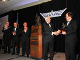 NASA's Mars Science Laboratory mission, which landed the rover Curiosity on Mars in August 2012, accepts the Robert J. Collier Trophy from the National Aeronautic Association at a ceremony in Arlington, Va., on May 9, 2013.
