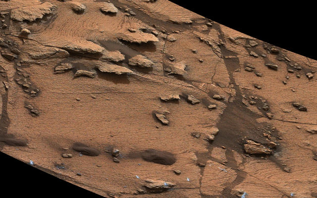 This image shows an example of a thin-laminated, evenly stratified rock type that occurs in the "Pahrump Hills" outcrop at the base of Mount Sharp on Mars. The Mastcam on NASA's Curiosity Mars rover acquired this view on Oct. 28, 2014. This type of rock can form under a lake.