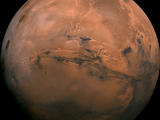Mosaic of the Valles Marineris hemisphere of Mars projected into point perspective, a view similar to that which one would see from a spacecraft.