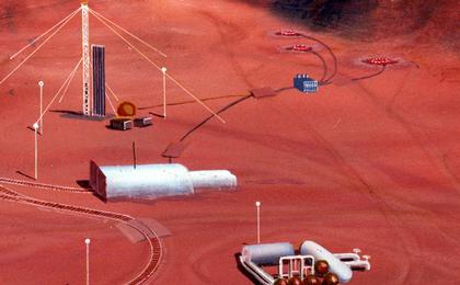 In this artist's concept, a human habitat on Mars with a greenhouse and many facilities needed for survival.