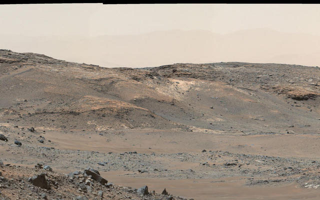 This April 16, 2015, panorama from the Mast Camera on NASA's Curiosity Mars rover shows a detailed view toward two areas on lower Mount Sharp chosen for close-up inspection in subsequent weeks: "Mount Shields" and "Logan Pass."