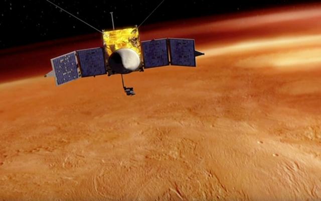 This artist's concept depicts NASA's Mars Atmosphere and Volatile EvolutioN (MAVEN) spacecraft orbiting Mars.