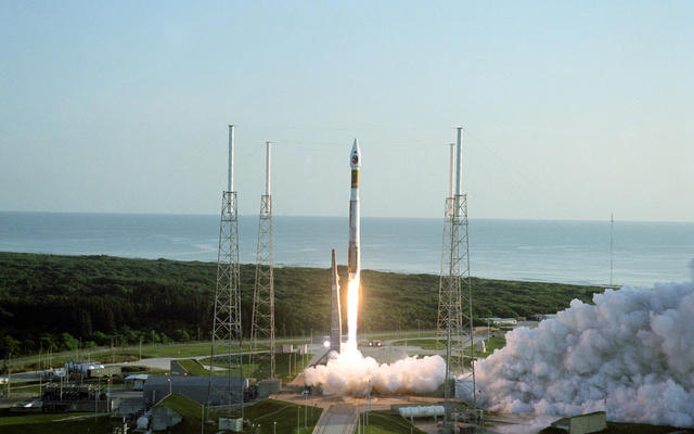 With the Atlantic Ocean as a backdrop, an Atlas V launch vehicle, 19 stories tall, with a two-ton Mars Reconnaissance Orbiter on top, roars away from Launch Complex 41 at Cape Canaveral Air Force Station at 7:43 a.m. EDT on Aug. 12, 2005.