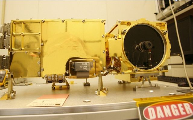 The two main parts of the ChemCam laser instrument for NASA's Mars Science Laboratory mission are shown in this combined image.