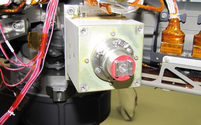 The sensor head on the Alpha Particle X-ray Spectrometer instrument was installed during testing at NASA's Jet Propulsion Laboratory. The instrument is part of the Curiosity rover, which will fly on NASA's Mars Science Laboratory mission. For perspective, the sensor head is 7.8 centimeters, or about 3 inches tall.