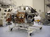 At the Payload Hazardous Servicing Facility at NASA's Kennedy Space Center in Florida, integration between a rocket-powered descent stage and NASA's Mars Science Laboratory (MSL) rover, known as Curiosity, is complete. The descent stage will lower Curiosity to the surface of Mars.