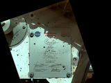 This view of Curiosity's deck shows a plaque bearing several signatures of US officials, including that of President Obama and Vice President Biden.