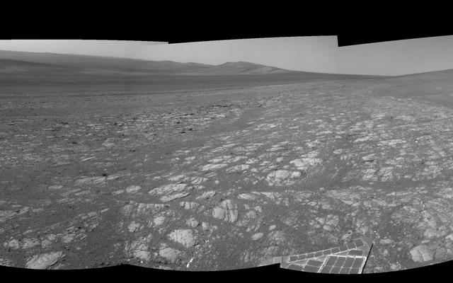 On the horizon in the right half of this panoramic view is an area of Mars informally named "Matijevic Hill," in commemoration of an influential rover-team leader.