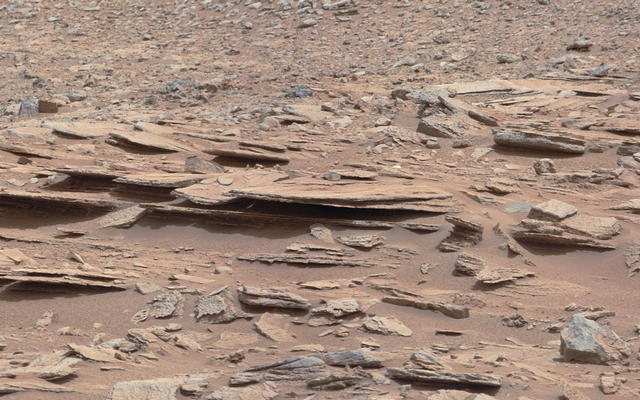 The NASA Mars rover Curiosity used its Mast Camera (Mastcam) during the mission's 120th Martian day, or sol (Dec. 7, 2012), to record this view of a rock outcrop informally named "Shaler."