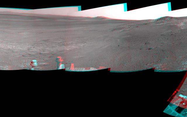 This full-circle, stereo panorama shows the terrain around the NASA Mars Exploration Rover Opportunity during the 3,105th Martian day, or sol, of the rover's work on Mars (Oct. 18, 2012).