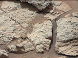 This image of an outcrop at the "Sheepbed" locality, taken by NASA's Curiosity Mars rover with its right Mast Camera (Mastcam), shows well-defined veins filled with whitish minerals, interpreted as calcium sulfate.