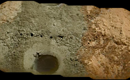 A day after NASA's Mars rover Curiosity drilled the first sample-collection hole into a rock on Mars, the rover's Chemistry and Camera (ChemCam) instrument shot laser pulses into the fresh rock powder that the drilling generated.