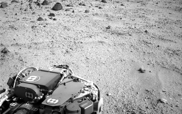 Mars rover Curiosity at the end of a drive of about 135 feet (41 meters) during the 329th Martian day, or sol, of the rover's work on Mars (July 9, 2013).