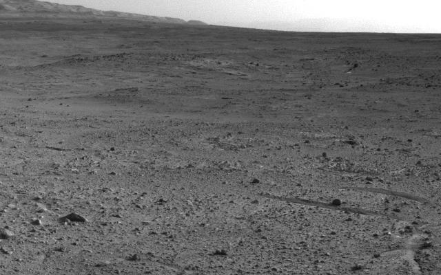 NASA's Mars rover Curiosity captured this view using its Navigation Camera (Navcam) after reaching the top of a rise called "Panorama Point" with a drive during the 388th Martian day, or sol, of the rover's work on Mars (Sept. 8, 2013).