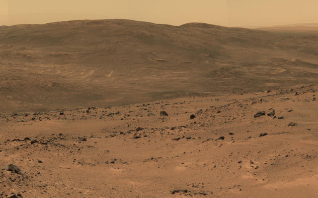 This section from a panorama that NASA's Mars Exploration Rover Spirit acquired in October 2005 from the top of "Husband Hill" presents the view toward the south from that summit.