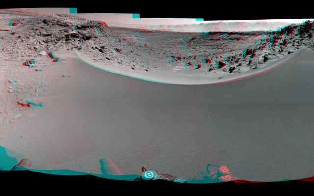 This stereo mosaic of images from the Navigation Camera (Navcam) on NASA's Mars rover Curiosity shows the terrain to the west from the rover's position on the 528th Martian day, or sol, of the mission (Jan. 30, 2014).