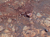 This image from the panoramic camera (Pancam) on NASA's Mars Exploration Rover Opportunity shows where a rock called "Pinnacle Island" had been before it appeared in front of the rover in early January 2014.
