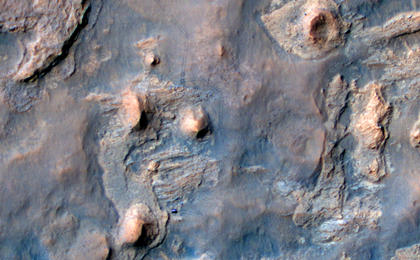NASA's Curiosity Mars rover and tracks from its driving are visible in this view from orbit, acquired on April 11, 2014, by the High Resolution Imaging Science Experiment (HiRISE) camera on NASA's Mars Reconnaissance Orbiter.