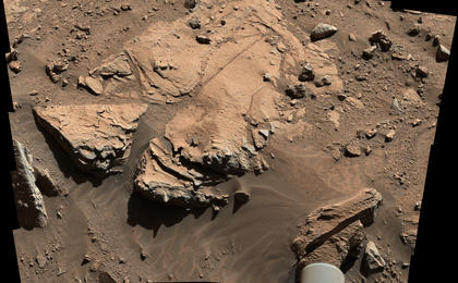 NASA's Curiosity Mars rover has driven within robotic-arm's reach of the sandstone slab at the center of this April 23 view from the rover's Mast Camera.