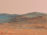 This vista of the Endeavour Crater rim was acquired by NASA's Mars Exploration Rover Opportunity's panoramic camera on April 18, 2014, from "Murray Ridge" on the western rim of the crater. It is presented in false color to make differences in surface materials more easily visible.