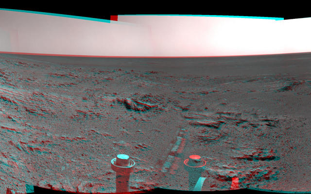 NASA's Mars Exploration Rover Opportunity used its navigation camera on May 10, 2014, to capture this stereo, 360-degree view near the ridgeline of Endeavour Crater's western rim. The center is southeastward. The view appears three-dimensional when seen through blue-red glasses.