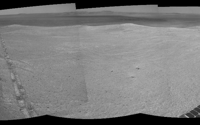 The component images for this 360-degree panorama were taken by the navigation camera on NASA's Mars Exploration Rover Opportunity after the rover drove about 97 feet southeastward on April 22, 2014. The location is on the western rim of Endeavour Crater. The two parallel tracks are 3.3 feet apart.