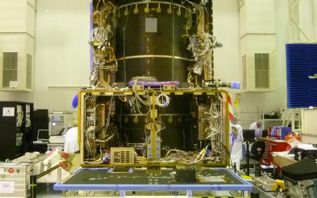 This June 2014 image from the clean room at Thales Alenia Space, in Cannes, France, shows ongoing assembly of the European Space Agency's ExoMars Trace Gas Orbiter, including the first of the orbiter's two Electra UHF relay radios provided by NASA.
