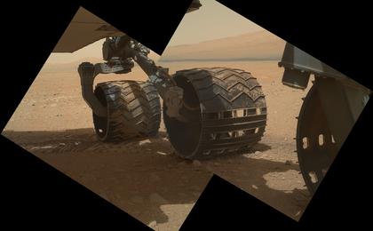 This view of the three left wheels of NASA's Mars rover Curiosity combines two images that were taken by the rover's Mars Hand Lens Imager (MAHLI) during the 34th Martian day, or sol, of Curiosity's work on Mars (Sept. 9, 2012).