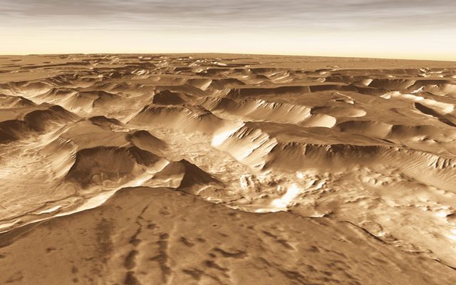 West of Valles Marineris lies a checkerboard named Noctis Labyrinthus, which formed when the Martian crust stretched and fractured.