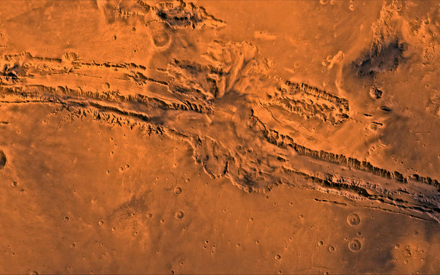 A color image of Valles Marineris, the great canyon of Mars; north toward top.