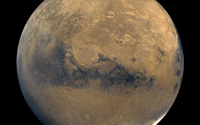 This mosaic of Mars is composed of about 100 Viking Orbiter images. The images were acquired in 1980 during mid-northern summer on Mars.