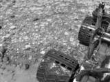 NASA's Curiosity Mars rover used its Navigation Camera (Navcam) to capture this view partway back down a slope it climbed toward "Marias Pass" on lower Mount Sharp.