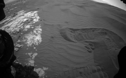 This view captures Curiosity's current work area where the rover continues its campaign to study an active sand dune on Mars.