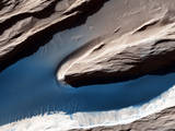 Wind-carved features such as these, called "yardangs,"  are common on the Red Planet.