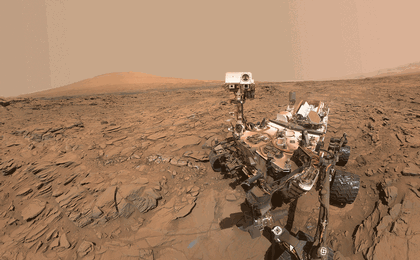 This animated image blinks two versions of a May 11, 2016, selfie of NASA's Curiosity Mars rover at a drilled sample site called "Okoruso." In one version, cameras atop the rover's mast face the arm-mounted camera taking the portrait. In the other, they face away.
