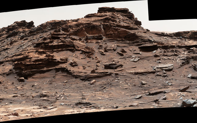 The top of the butte in this Sept. 1, 2016, scene from the Mast Camera (Mastcam) on NASA's Curiosity Mars rover stands about 16 feet above the rover and about 82 feet east-southeast of the rover. The site is in the "Murray Buttes" area of lower Mount Sharp, and this particular butte is called "M9a."
