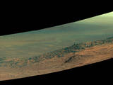 This scene from NASA's Mars rover Opportunity shows "Wharton Ridge," on the western rim of Endeavour Crater. The ridge's name honors the memory of astrobiologist Robert A. Wharton (1951-2012). The scene is presented in enhanced color to make differences in surface materials more easily visible.