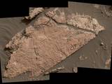 The network of cracks in this Martian rock slab called "Old Soaker" may have formed from the drying of a mud layer more than 3 billion years ago. The view spans about 3 feet (90 centimeters) left-to-right and combines three images taken by the MAHLI camera on the arm of NASA's Curiosity Mars rover.