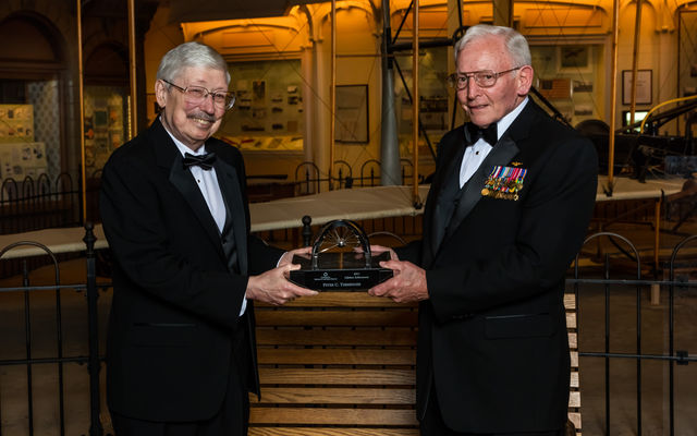 The 2017 National Air and Space Museum Trophy for Lifetime Achievement was handed to Peter Theisinger, left, by Gen. J.R. "Jack" Dailey, the museum's director, on March 29. At NASA's Jet Propulsion Laboratory, Theisinger worked on missions to six planets and led projects that put three rovers on Mars.