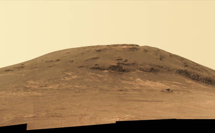Wheel tracks from NASA's Mars rover Opportunity descending and departing the "Cape Tribulation" segment of Endeavour Crater's rim are visible in this April 21, 2017, view from the rover's Panoramic Camera (Pancam). The rover looked back northward during its trek south to "Perseverance Valley."