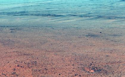 The Pancam on NASA's Mars Exploration Rover Opportunity took the component images of this enhanced-color scene during the mission's "walkabout" survey of an area just above the top of "Perseverance Valley," in preparation for driving down the valley.