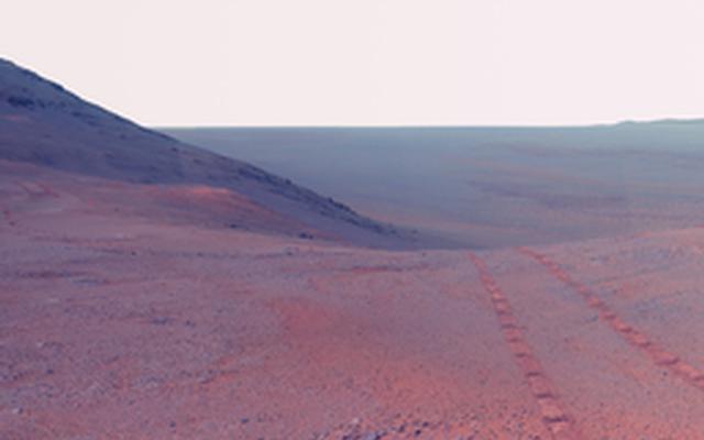 This June 2017 view  from the Pancam on NASA's Opportunity Mars rover shows the area just above  "Perseverance Valley" on the western rim of Endeavour Crater. Color  has been enhanced to make differences in surface materials more easily.