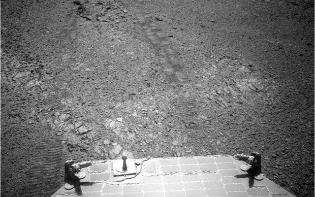 This July 18, 2017, image from the navigation camera (Navcam) on the mast of NASA's Mars Exploration Rover Opportunity provides a look back to the crest of Endeavour Crater's rim after the rover began descending "Perseverance Valley" on the rim's inner slope.