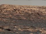 "Vera Rubin Ridge," a favored destination for NASA's Curiosity Mars rover even before the rover landed in 2012, rises near the rover nearly five years later in this panorama from Curiosity's Mastcam. The scene combines 23 images taken with the Mastcam's right-eye camera, on June 22, 2017.